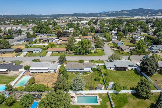 14006 E Cataldo Ave, Spokane Valley, WA 99216 - aerial perspective of suburban area with a pool area and mountains