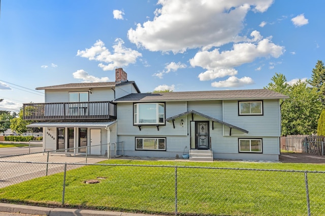 13015 E Mallon Ct, Spokane Valley, WA 99216 - view of front of property featuring a balcony and a chimney