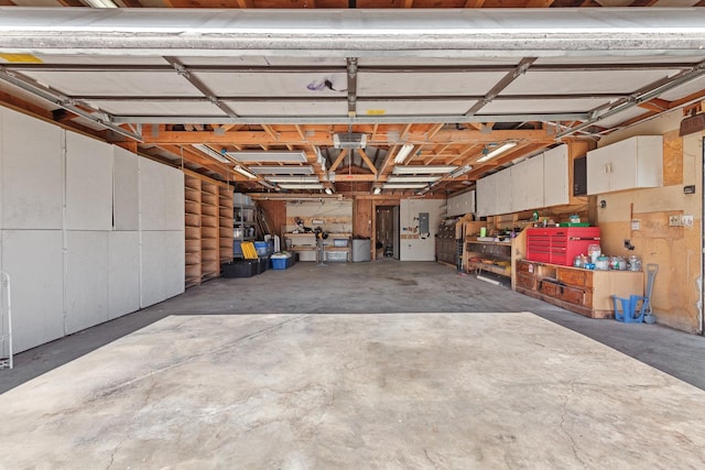 13015 E Mallon Ct, Spokane Valley, WA 99216 - garage with a workshop area and electric panel