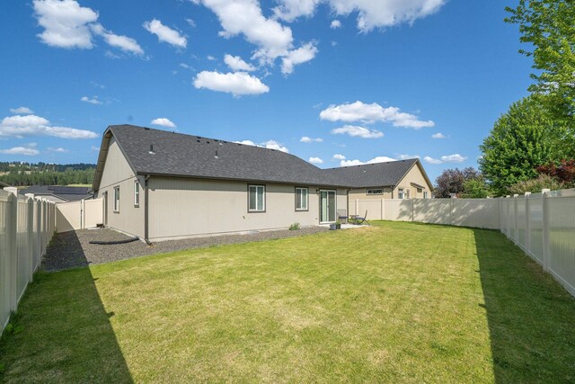 14520 E Everett Ct, Spokane Valley, WA 99216 - back of house featuring a fenced backyard and a shingled roof