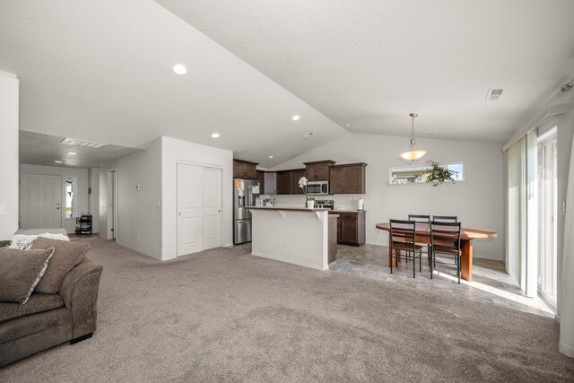 14520 E Everett Ct, Spokane Valley, WA 99216 - living area with lofted ceiling, light colored carpet, and recessed lighting