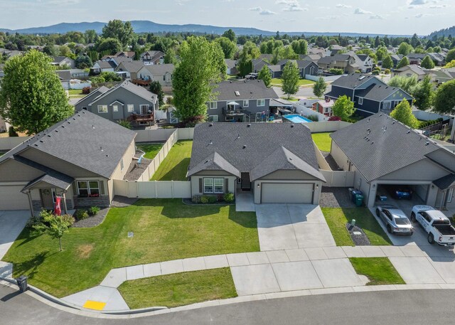 14520 E Everett Ct, Spokane Valley, WA 99216 - aerial perspective of suburban area with a mountain backdrop