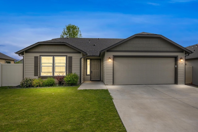 14520 E Everett Ct, Spokane Valley, WA 99216 - single story home with concrete driveway, an attached garage, and roof with shingles