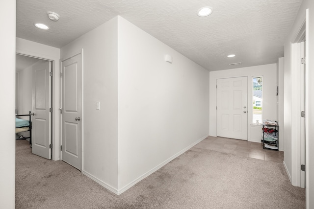14520 E Everett Ct, Spokane Valley, WA 99216 - entrance foyer with carpet flooring, a textured ceiling, and recessed lighting