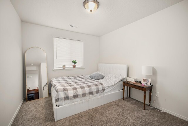 14520 E Everett Ct, Spokane Valley, WA 99216 - carpeted bedroom featuring baseboards