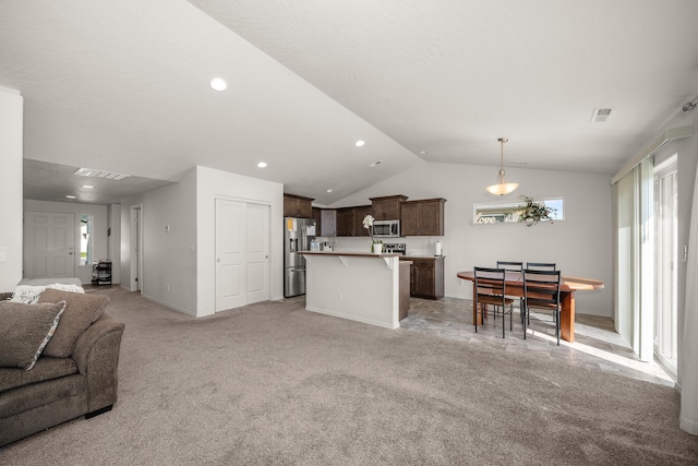 14520 E Everett Ct, Spokane Valley, WA 99216 - living area with vaulted ceiling, light colored carpet, and recessed lighting