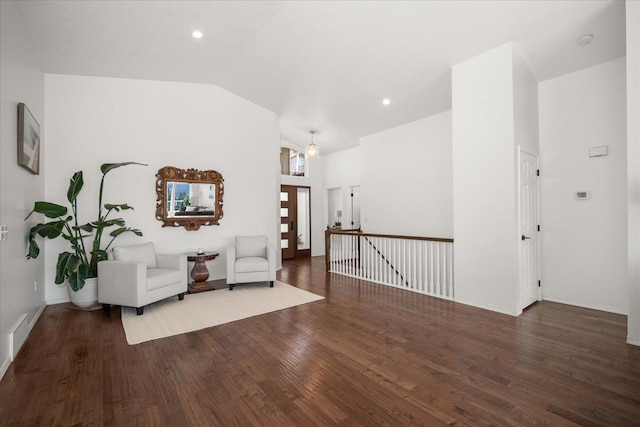 8422 E Sandlewood Ln, Spokane, WA 99217 - living area featuring wood finished floors, lofted ceiling, and recessed lighting