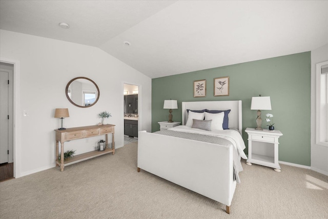 8422 E Sandlewood Ln, Spokane, WA 99217 - bedroom with lofted ceiling, carpet floors, and connected bathroom