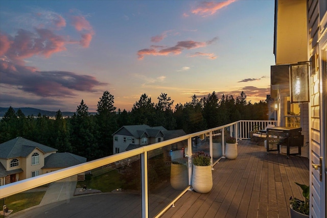8422 E Sandlewood Ln, Spokane, WA 99217 - deck at dusk featuring a grill