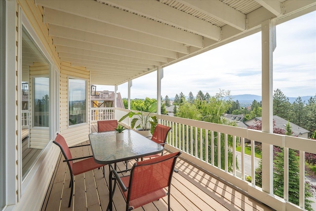8422 E Sandlewood Ln, Spokane, WA 99217 - wooden deck with a mountain view and outdoor dining area