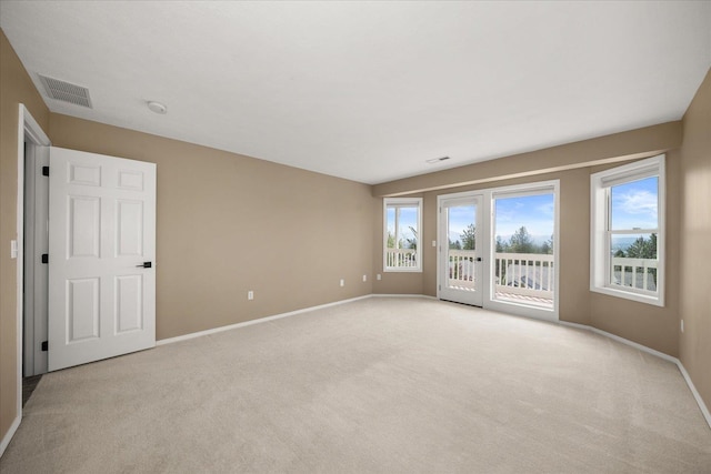 8422 E Sandlewood Ln, Spokane, WA 99217 - spare room with light colored carpet and a smoke detector