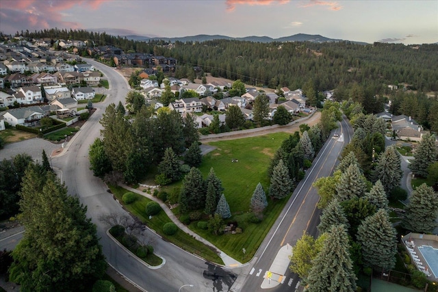 8422 E Sandlewood Ln, Spokane, WA 99217 - aerial view of property and surrounding area featuring nearby suburban area and a mountainous background