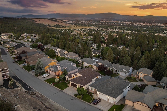 8422 E Sandlewood Ln, Spokane, WA 99217 - aerial view at dusk of a mountain view and a residential view