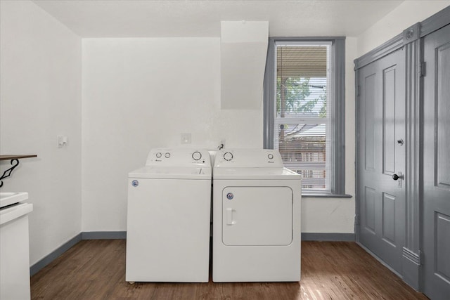 2003 W Mallon Ave, Spokane, WA 99201 - washroom featuring separate washer and dryer and wood finished floors