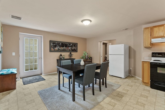 5981 Blackstone Way, Nine Mile Falls, WA 99026 - dining space featuring baseboards and arched walkways
