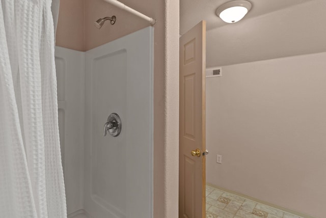 5981 Blackstone Way, Nine Mile Falls, WA 99026 - full bathroom featuring a shower with shower curtain and baseboards