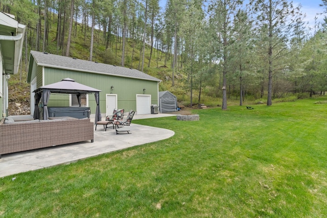 5981 Blackstone Way, Nine Mile Falls, WA 99026 - view of grassy yard with a patio area, a gazebo, and an outbuilding