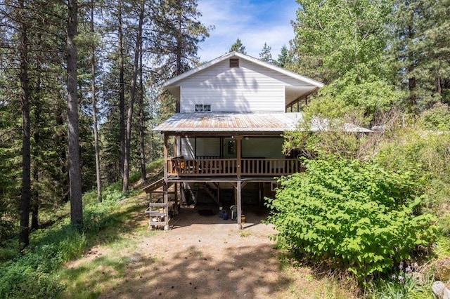 491 Winterfield Rd, Newport, WA 99156 - view of front of property with a deck, a metal roof, and stairs