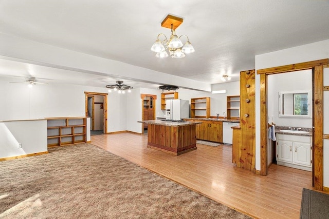 491 Winterfield Rd, Newport, WA 99156 - kitchen with white appliances, ceiling fan, light wood-style floors, and open floor plan