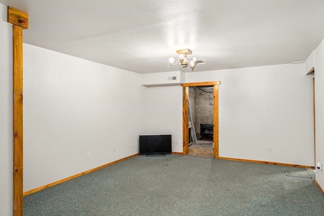 491 Winterfield Rd, Newport, WA 99156 - carpeted spare room featuring a chandelier and baseboards
