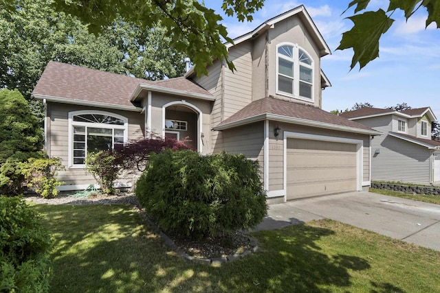 1707 N Harmony Ln, Greenacres, WA 99016 - view of front of house with concrete driveway, a front yard, a garage, and a shingled roof
