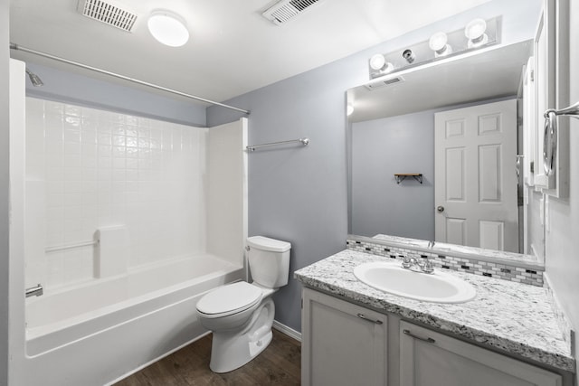 1707 N Harmony Ln, Greenacres, WA 99016 - bathroom featuring wood finished floors, tub / shower combination, and vanity