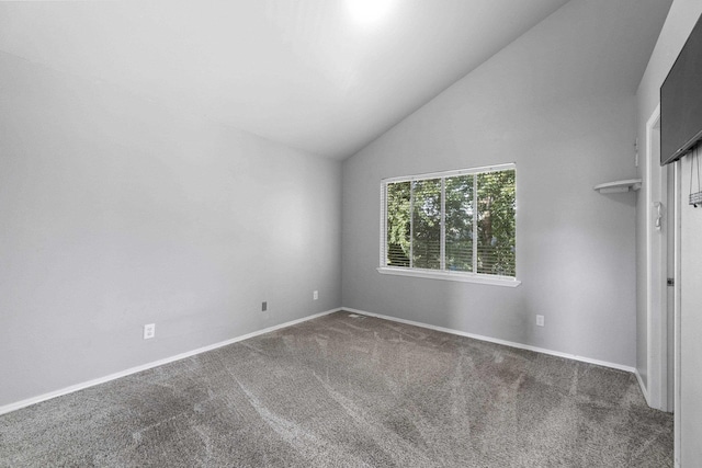 1707 N Harmony Ln, Greenacres, WA 99016 - unfurnished room with vaulted ceiling and carpet