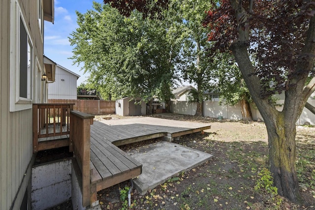 1707 N Harmony Ln, Greenacres, WA 99016 - fenced backyard featuring a deck and a storage shed