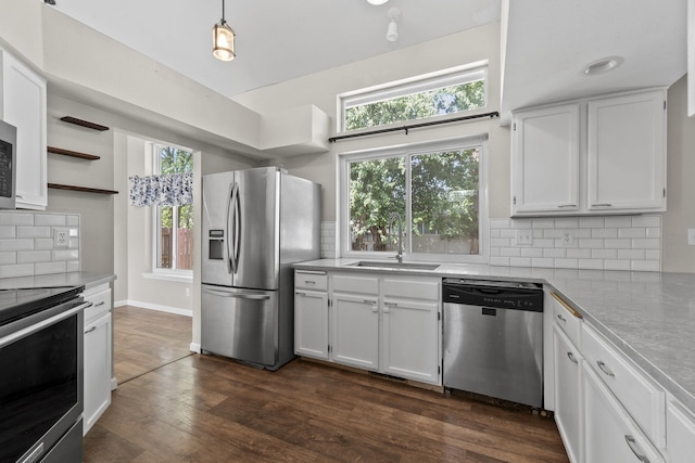 1707 N Harmony Ln, Greenacres, WA 99016 - kitchen featuring stainless steel appliances, open shelves, white cabinetry, tasteful backsplash, and light countertops