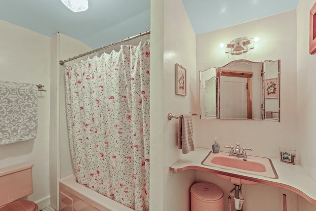 11 E Camden Rd, Elk, WA 99009 - bathroom featuring a sink and shower / tub combo with curtain