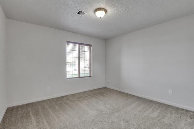 7316 S Dour St, Cheney, WA 99004 - spare room featuring carpet floors and a textured ceiling