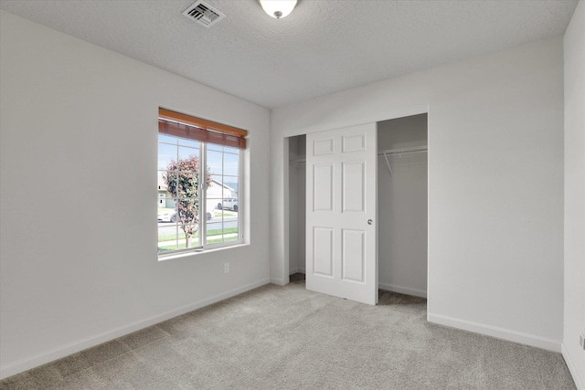 7316 S Dour St, Cheney, WA 99004 - unfurnished bedroom with light carpet and a closet