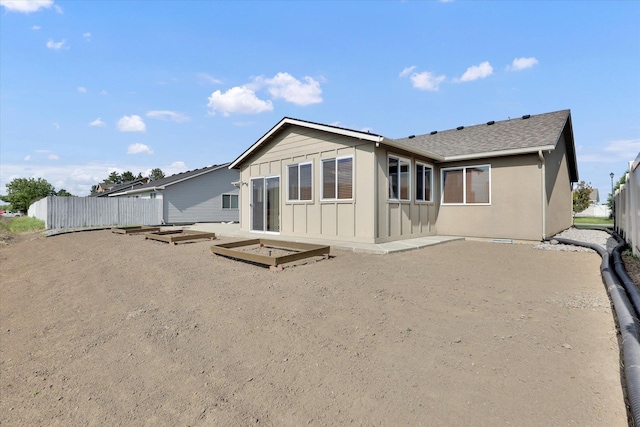 7316 S Dour St, Cheney, WA 99004 - rear view of house featuring board and batten siding and a shingled roof