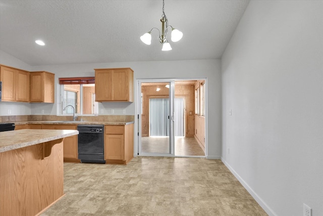 7316 S Dour St, Cheney, WA 99004 - kitchen with dishwasher, light countertops, a chandelier, decorative light fixtures, and a breakfast bar area
