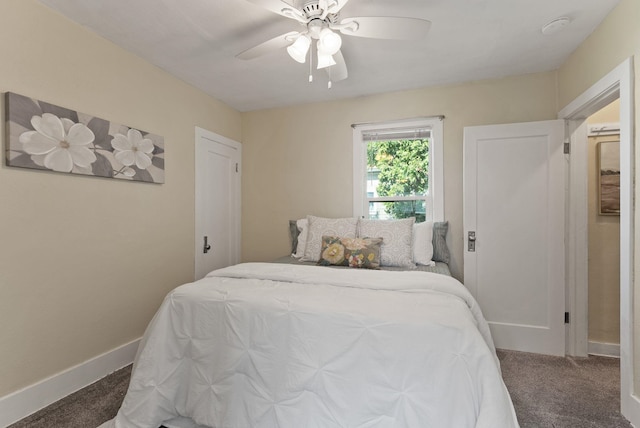 417 E Providence Ave, Spokane, WA 99207 - carpeted bedroom featuring baseboards and a ceiling fan