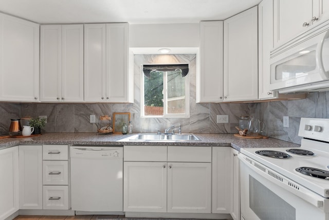 417 E Providence Ave, Spokane, WA 99207 - kitchen with white appliances, white cabinetry, and backsplash