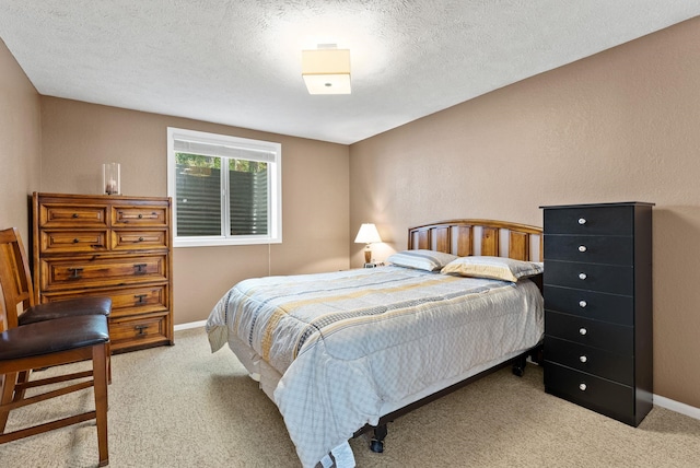 15007 W Willynwood Ln, Nine Mile Falls, WA 99026 - carpeted bedroom featuring baseboards and a textured ceiling