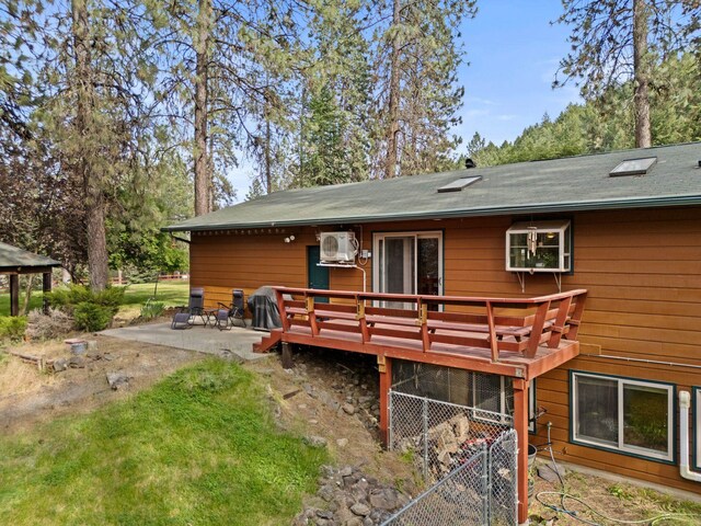 15007 W Willynwood Ln, Nine Mile Falls, WA 99026 - back of property with a patio area and a deck