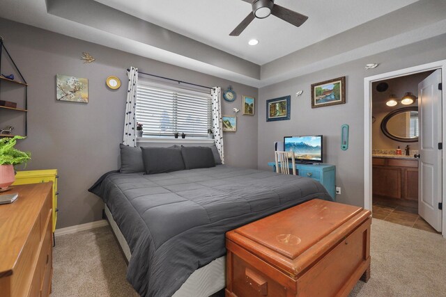 8630 W Campus Dr, Spokane, WA 99224 - bedroom featuring light colored carpet, recessed lighting, ensuite bathroom, and a raised ceiling