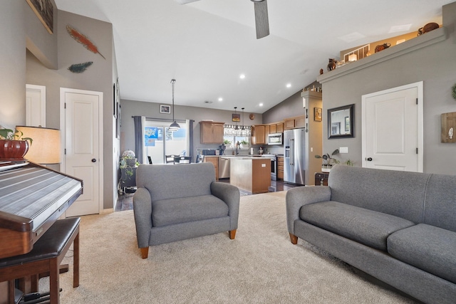 8630 W Campus Dr, Spokane, WA 99224 - living room featuring vaulted ceiling, ceiling fan, light carpet, and recessed lighting