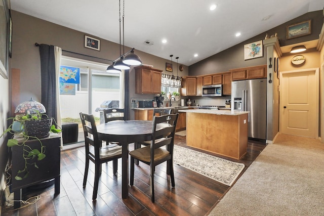 8630 W Campus Dr, Spokane, WA 99224 - dining area featuring dark wood finished floors, recessed lighting, and lofted ceiling