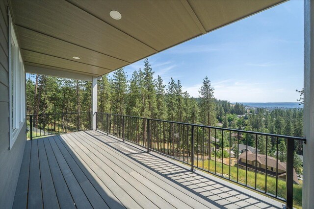 4219 W Tolliver Ct, Spokane, WA 99208 - wooden deck with a wooded view