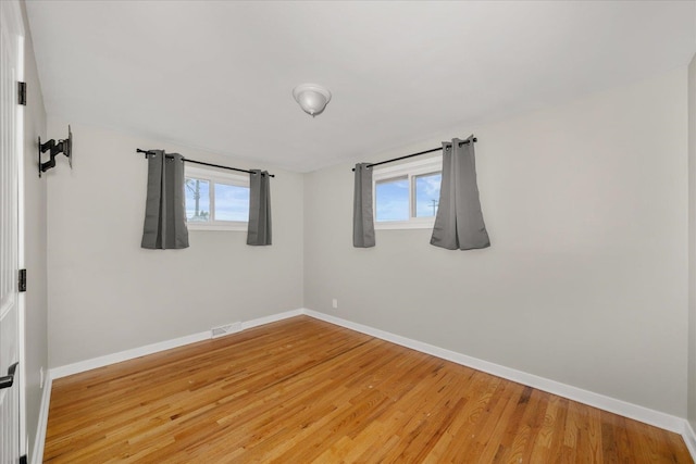 5615 N Forest Blvd, Spokane, WA 99205 - spare room with plenty of natural light and light wood-style floors