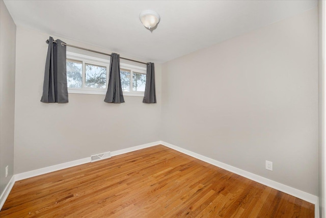 5615 N Forest Blvd, Spokane, WA 99205 - empty room with wood finished floors