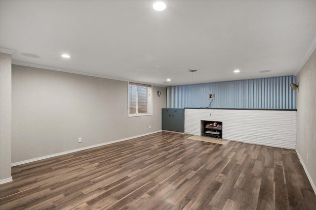 5615 N Forest Blvd, Spokane, WA 99205 - unfurnished living room featuring wood finished floors, a fireplace, ornamental molding, and recessed lighting