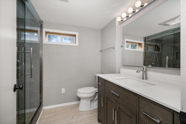 5615 N Forest Blvd, Spokane, WA 99205 - full bathroom with vanity, wood finished floors, and an enclosed shower