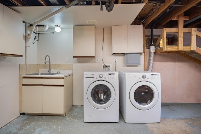 5615 N Forest Blvd, Spokane, WA 99205 - laundry area with cabinet space and washing machine and dryer