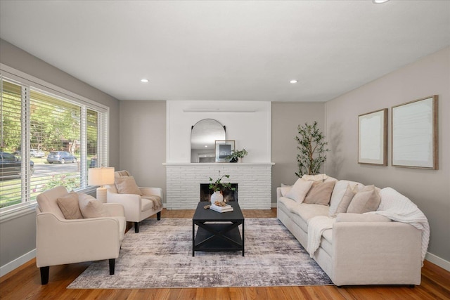 5615 N Forest Blvd, Spokane, WA 99205 - living area featuring wood finished floors, recessed lighting, and a brick fireplace