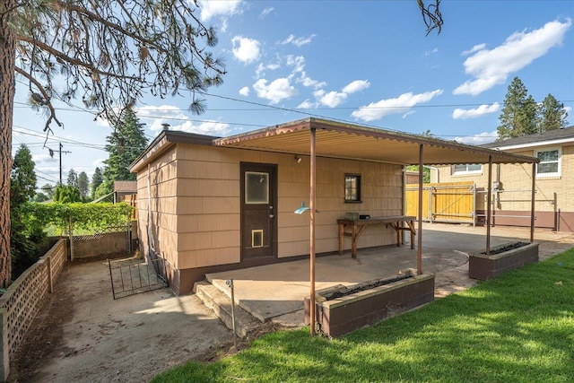 5615 N Forest Blvd, Spokane, WA 99205 - back of house featuring a gate and a patio