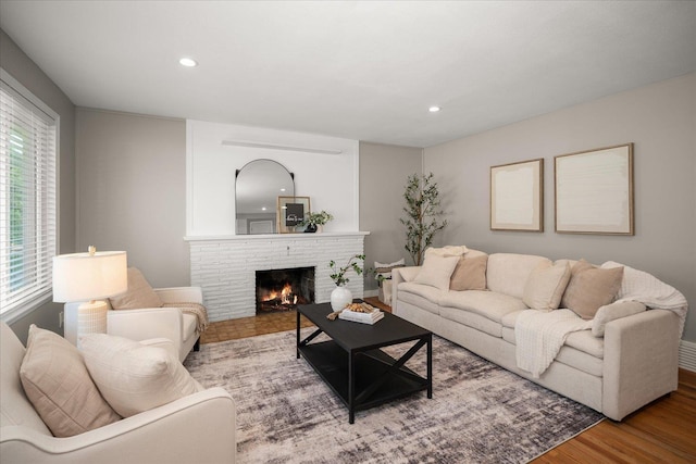 5615 N Forest Blvd, Spokane, WA 99205 - living room with recessed lighting, wood finished floors, a fireplace, and plenty of natural light